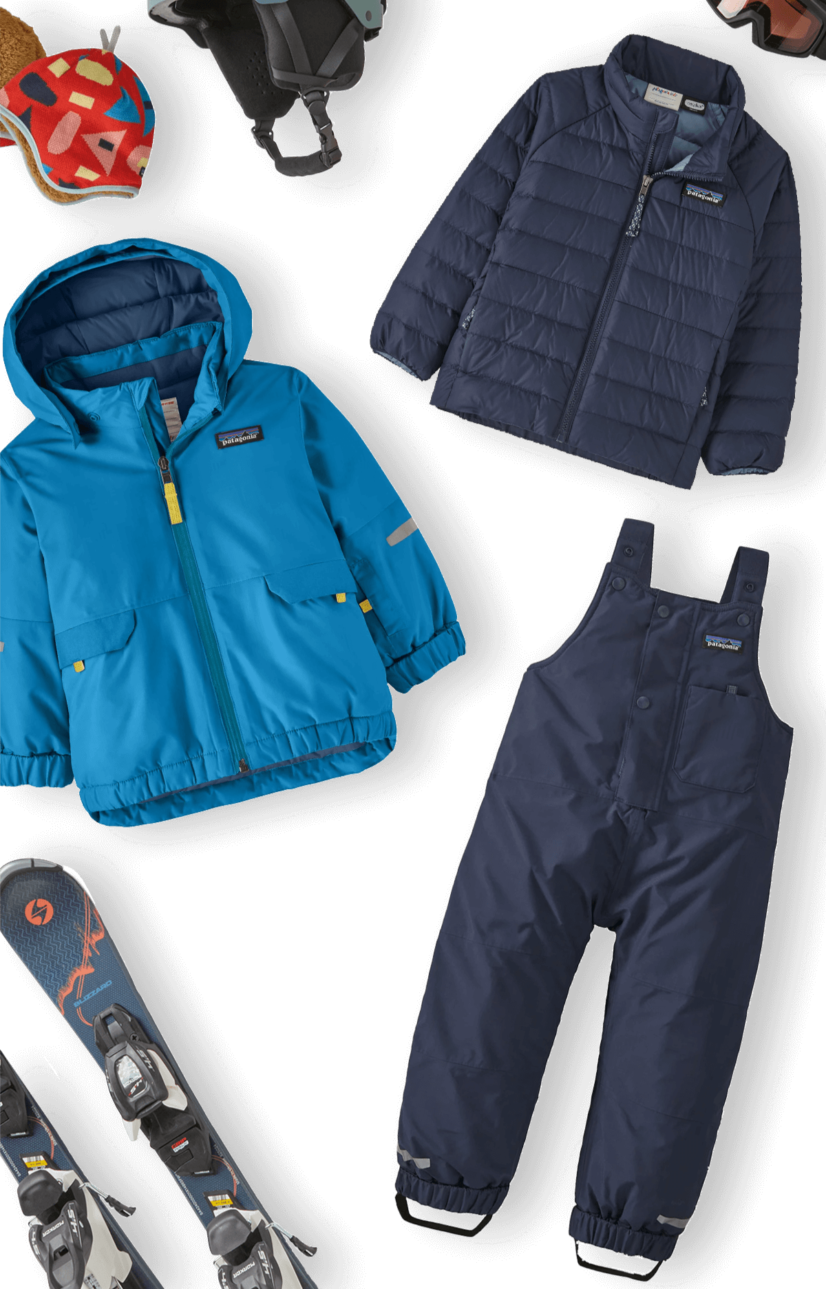 An assortment of kids' snow clothing and gear.