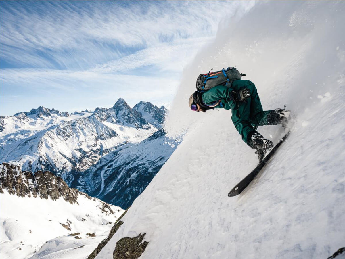 Nick Russell leans into some French powder waves in the Chamonix backcountry.